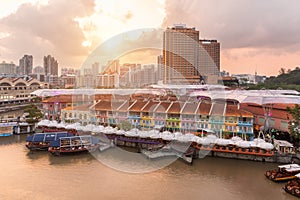 Colorful light building at night in Clarke Quay, Singapore. Clarke Quay, is a historical riverside quay in Singapore.