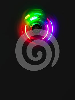 Colorful light neon circle in dark black background