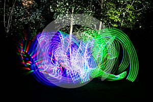 Colorful Light Painting Neon Motion effect. Using a light up flashing kids sword with a long exposure at night.