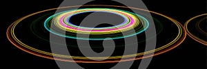 Colorful Light Patterns Creating Mesmerizing Concentric Circles in a Dark Background