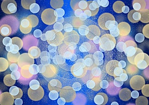 Colorful Lights Bokeh and Glitters in Blue Gradient Background