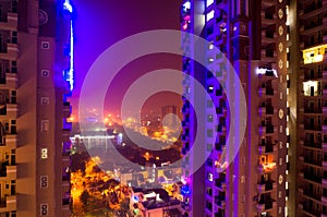 Colorful lights on noida skyscraper photo