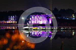 colorful lightshow on a lake at night