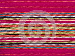 The colorful linear patterns of a cloth dishtowel
