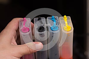 Colorful liquid in plastic opaque bottles