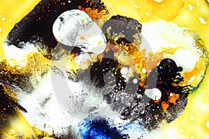 Colorful liquids mixed together to an abstract painting