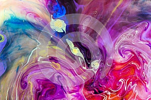Colorful liquids underwater. Colorful abstract composition.