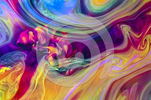 Colorful liquids underwater. Psychedelic colors. photo