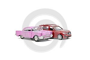 Colorful little mini red pink retro vintage plastic sedan car toy isolated on white background mockup with copy space, toys for