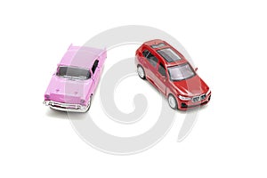 Colorful little mini red pink retro vintage plastic sedan car toy isolated on white background mockup with copy space, toys for