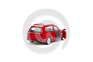 Colorful little mini red plastic sedan car toy isolated on white background mockup with copy space, toys for children,for boys,