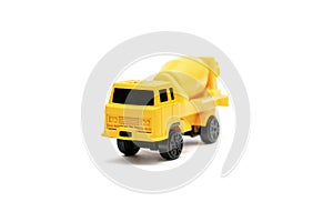 Colorful little mini yellow plastic concrete mixer, truck, lorry, car automobile toy isolated on white background mockup with copy