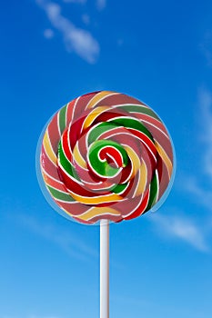 Colorful lollipop with blue sky background