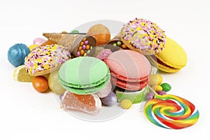 Colorful lollipops and different colored round candy. Top view