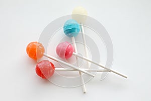 Colorful lollipops and suckers on a white background isolated