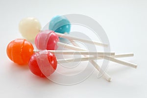Colorful lollipops and suckers on a white background isolated