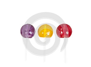 Colorful lolly pop candies on white