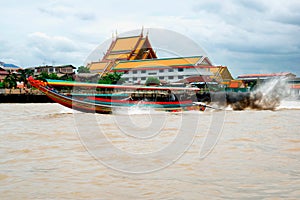 Colorful longtail boat on Chaopraya river in Bangkok