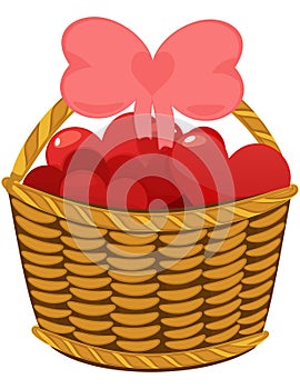 Colorful love hearts in wicker basket