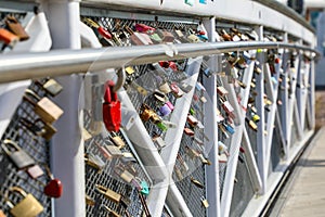 Colorful love locks on bridge in Helsinki