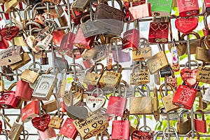 Colorful love locks on the fence