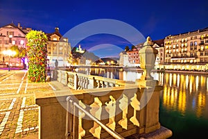 Colorful Luzern Reuss river waterfront evening view