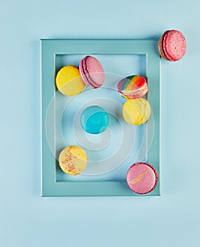 Colorful Macarons in Blue Frame