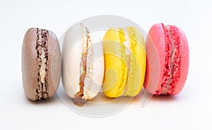 Colorful macarons or cakes with a sweet topping