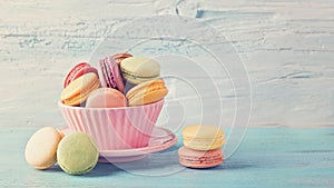 Colorful macarons in a cup