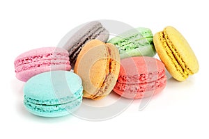 Colorful macarons isolated on white background closeup