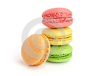 Colorful macarons isolated on white background closeup