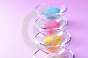 Colorful macarons or macaroons in Glass cup dessert sweet beautiful to eat