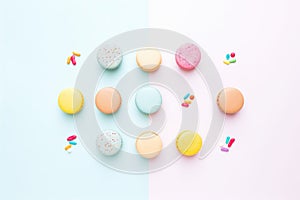 colorful macarons neatly aligned on pastel surface