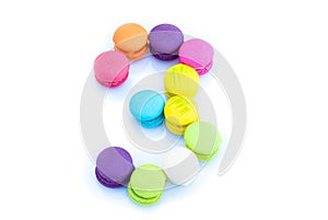 Colorful macarons,number 3 on white background