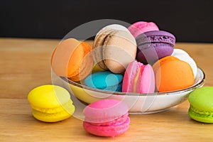 Colorful macaroon in ceramic plate