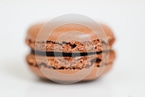 Colorful macaroon dessert on white background.