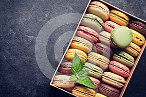 Colorful macaroons in a box photo