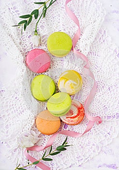 Colorful macaroons on a ligth background.