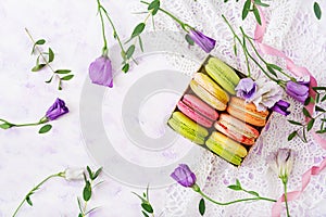 Colorful macaroons on a ligth background.