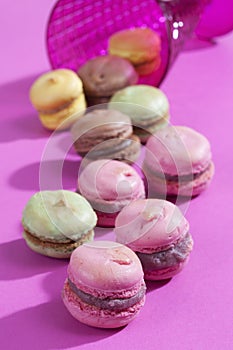 Colorful macaroons, pink background