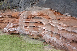 Colorful magmatic layers, Camara do Lobos, Madeira photo