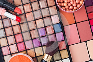 Colorful makeup brushes and makeup eye shadows