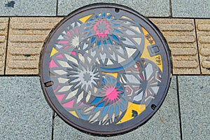 Colorful manhole cover in Matsumoto City
