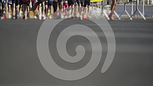 Colorful Marathon Runners With Blurred Shoes in Urban Setting