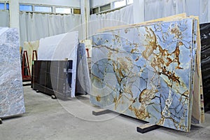 Colorful marble slabs in store show room. Quartzite slabs are prepared for sale in store yard