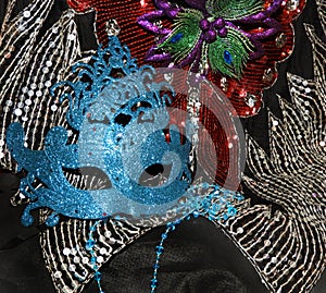Colorful Mardi Gras mask and sequin outfit New Orleans