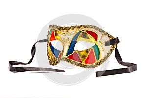 Colorful Mardi Gras Mask on white background with black ribbon (