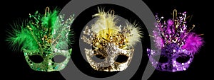 Colorful Mardi Gras masks isolated on black