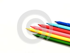 Colorful markers, for children drawing and coloring isolated on a white background