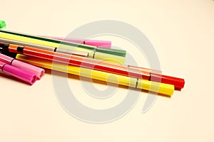 Colorful markers isolated on white for school background